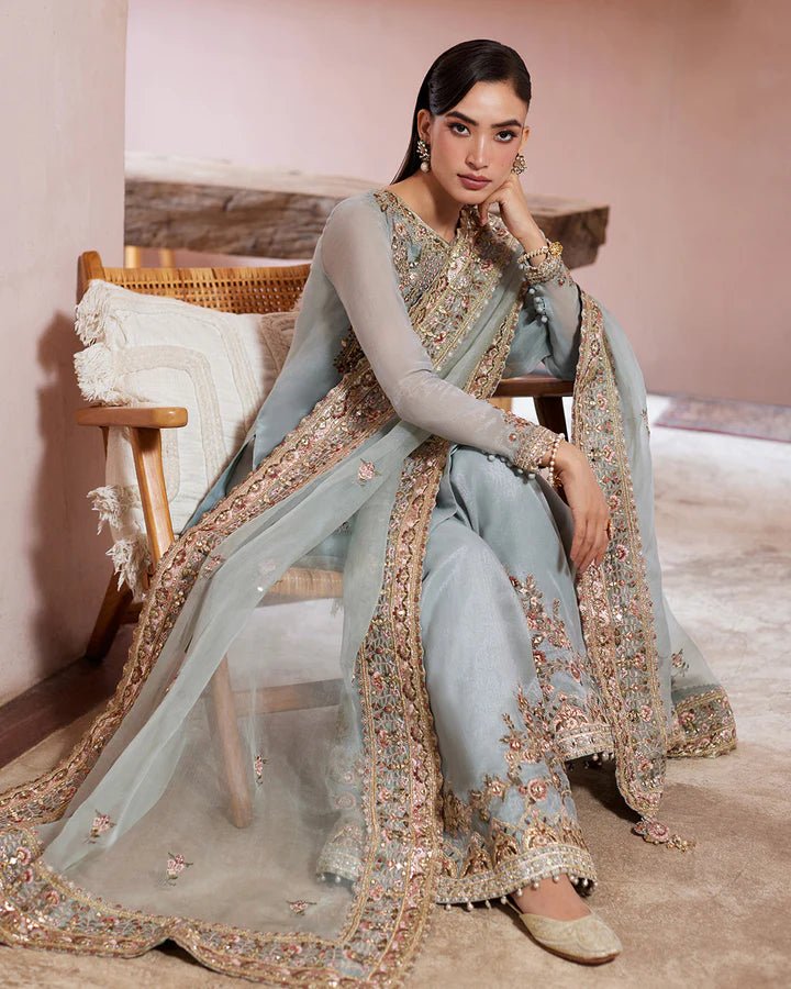Model wearing a pastel blue Zaafia dress from Faiza Saqlain's Lenora Luxury Pret '24 collection. Pakistani clothes online in UK.