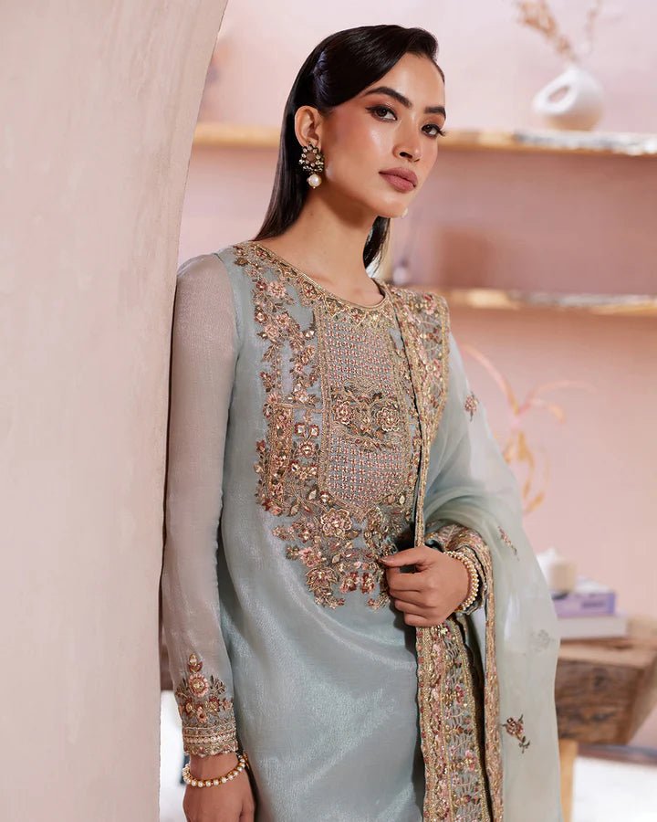 Model wearing a pastel blue Zaafia dress from Faiza Saqlain's Lenora Luxury Pret '24 collection. Pakistani clothes online in UK.