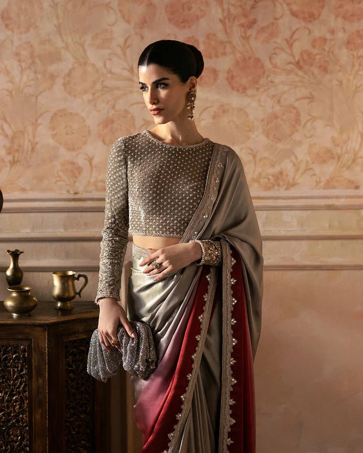 Model wearing a gray and maroon Caryn dress from Faiza Saqlain, ideal for Eid, highlighting Pakistani designer clothes in the UK.