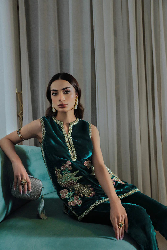 Model in emerald Simone dress from Saira Rizwan Luxury Pret Riona '23, an icon of Pakistani chic in the UK.