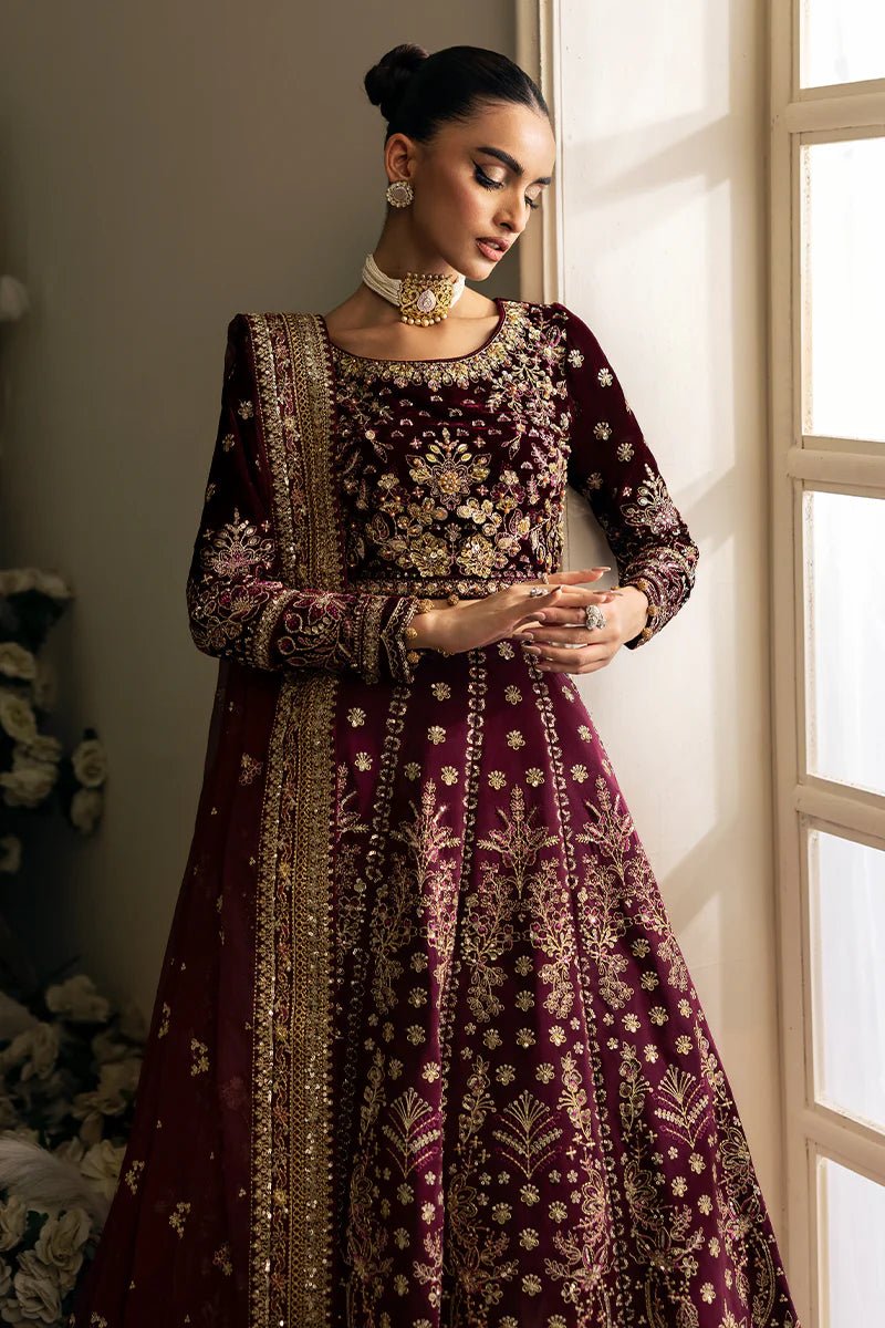Model wearing Carmine from Gulaal's Celeste Unstitched Velvet '24 collection in rich red. Luxury pret, festive, Pakistani clothes online in UK.