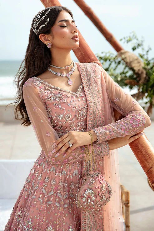 Model wearing Gulaal Azrina - GL - LP - 24V2 - 33 dress in soft pink from Emalyn Luxury Formals, ideal for weddings. Available for Pakistani clothes online in the UK.