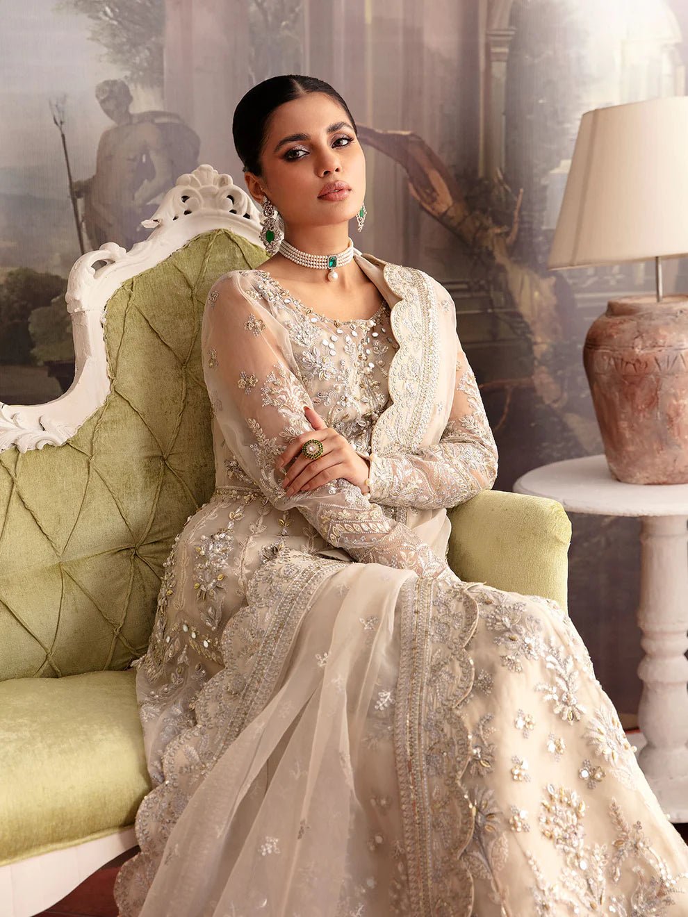 Model wearing a beige ARIANA GL - LP - V2 - 12 dress from Gulaal's Luxury Pret collection. Shop Pakistani clothes online in UK.