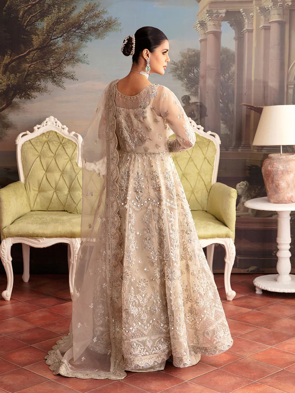 Model wearing a beige ARIANA GL - LP - V2 - 12 dress from Gulaal's Luxury Pret collection. Shop Pakistani clothes online in UK.
