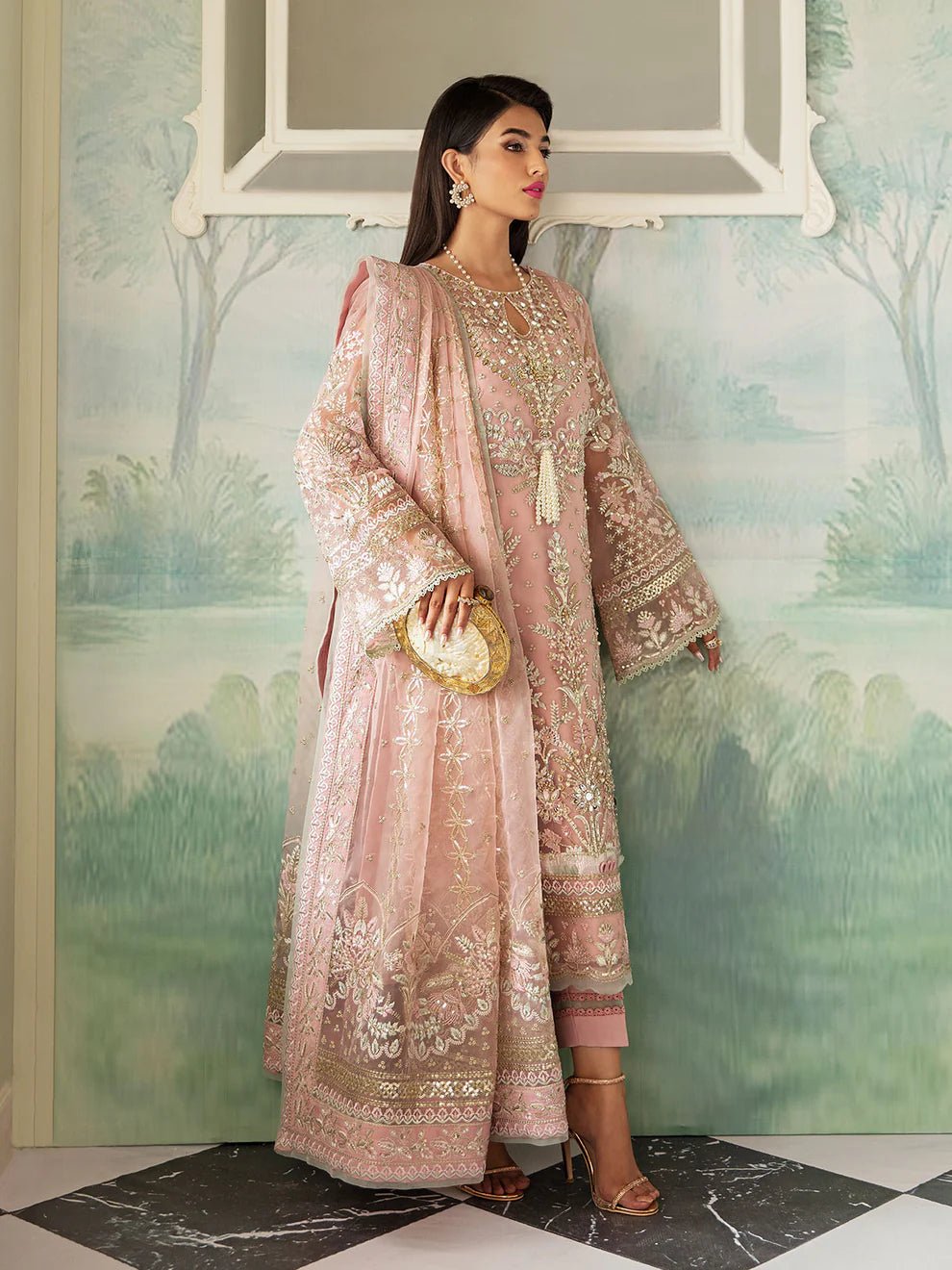 Model wearing blush pink AYSEL GL - LP - V2 - 11 dress from Gulaal, featuring intricate embroidery and luxurious embellishments, perfect for Pakistani clothes online in UK.