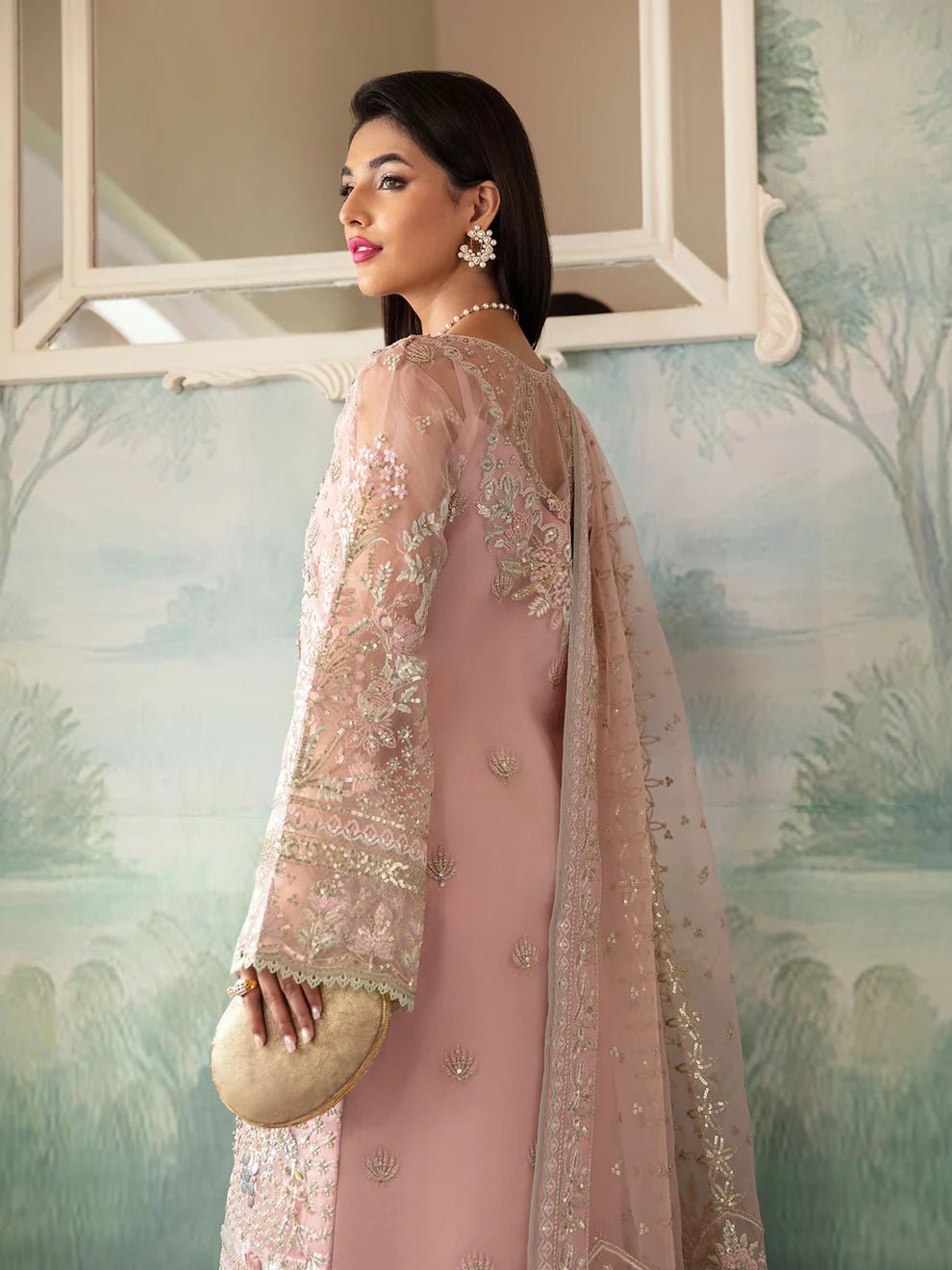 Model wearing blush pink AYSEL GL - LP - V2 - 11 dress from Gulaal, featuring intricate embroidery and luxurious embellishments, perfect for Pakistani clothes online in UK.