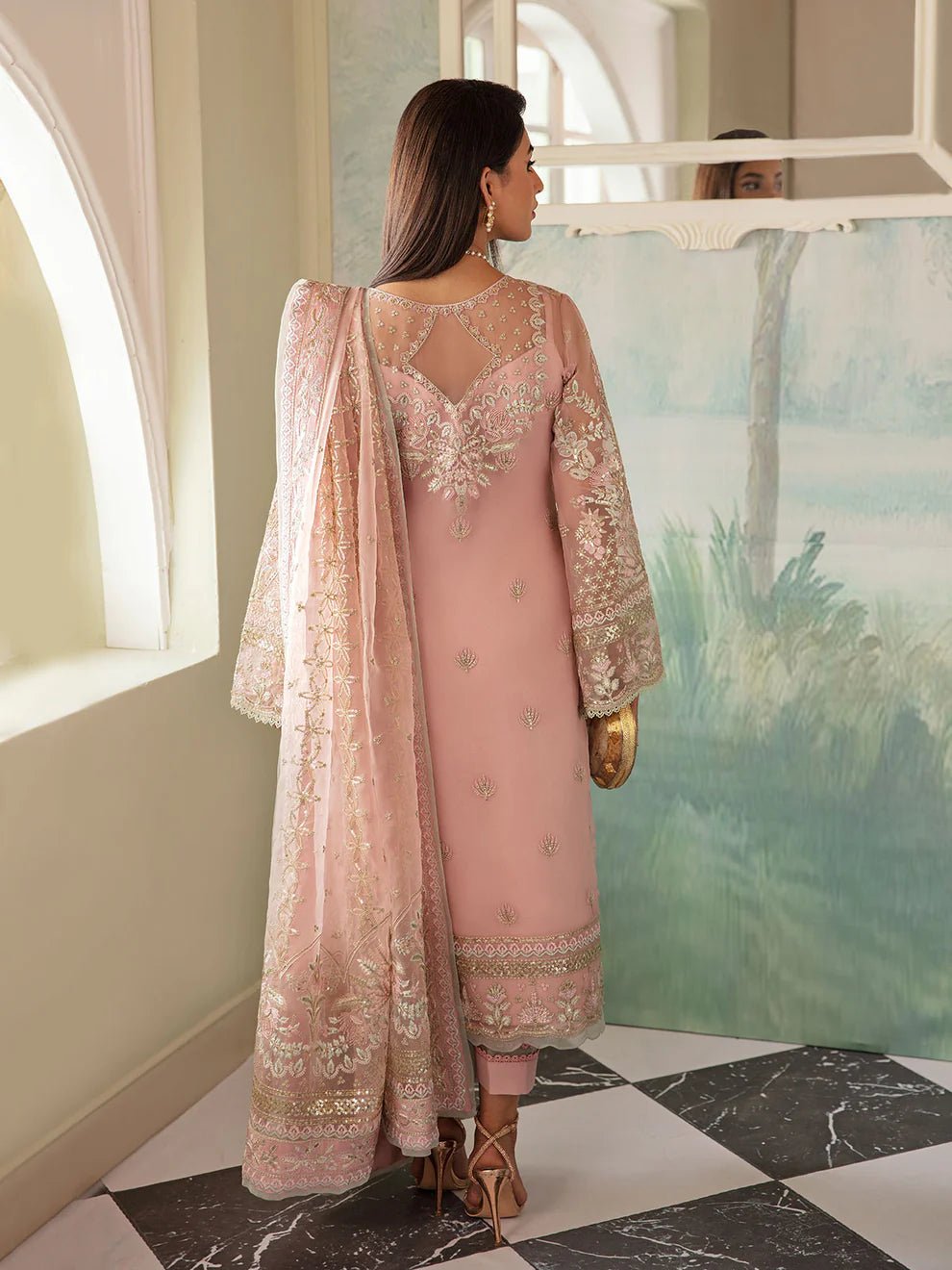 Model wearing blush pink AYSEL GL - LP - V2 - 11 dress from Gulaal, featuring intricate embroidery and luxurious embellishments, perfect for Pakistani clothes online in UK.