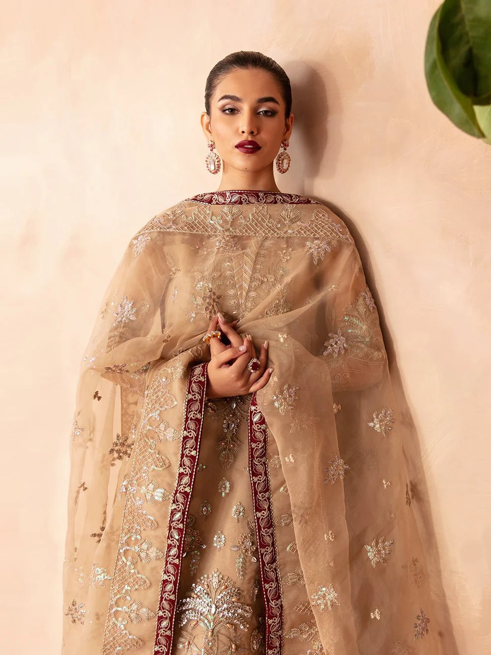 Model wearing Gulaal Luxury Pret EMILIA GL - LP - V2 - 14 dress in beige with intricate embroidery. Perfect for Pakistani clothes online in UK.