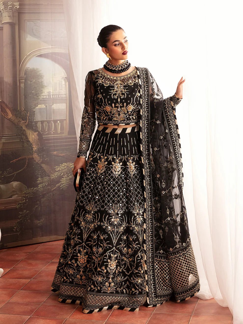 Model wearing a black STELLA GL - LP - V2 - 13 dress from Gulaal's Luxury Pret collection. Discover premium Pakistani clothes online in the UK.