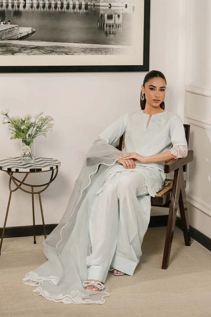 Model wearing ice blue AYRA-SREP1-03 from Saira Rizwan Luxury Lawn Eid Edit '25, ideal for Pakistani luxury pret and clothes online in UK.