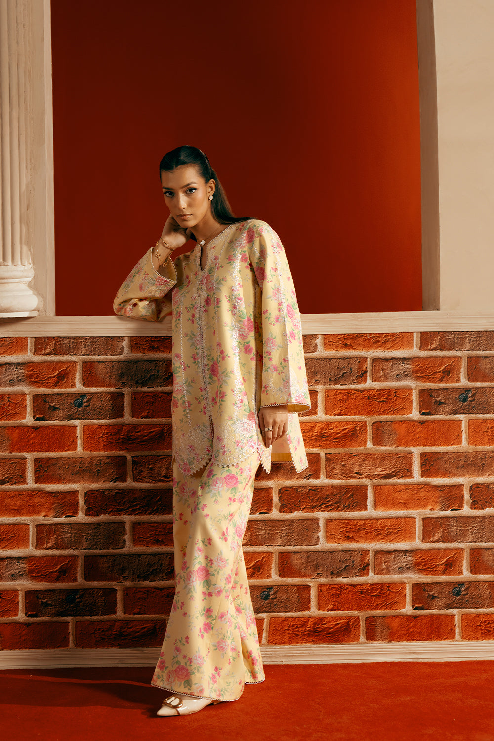 Model wearing yellow floral embroidered outfit from Saira Rizwan Joolie | YELLOW-JBP25-01, Pakistani luxury pret available online in UK.