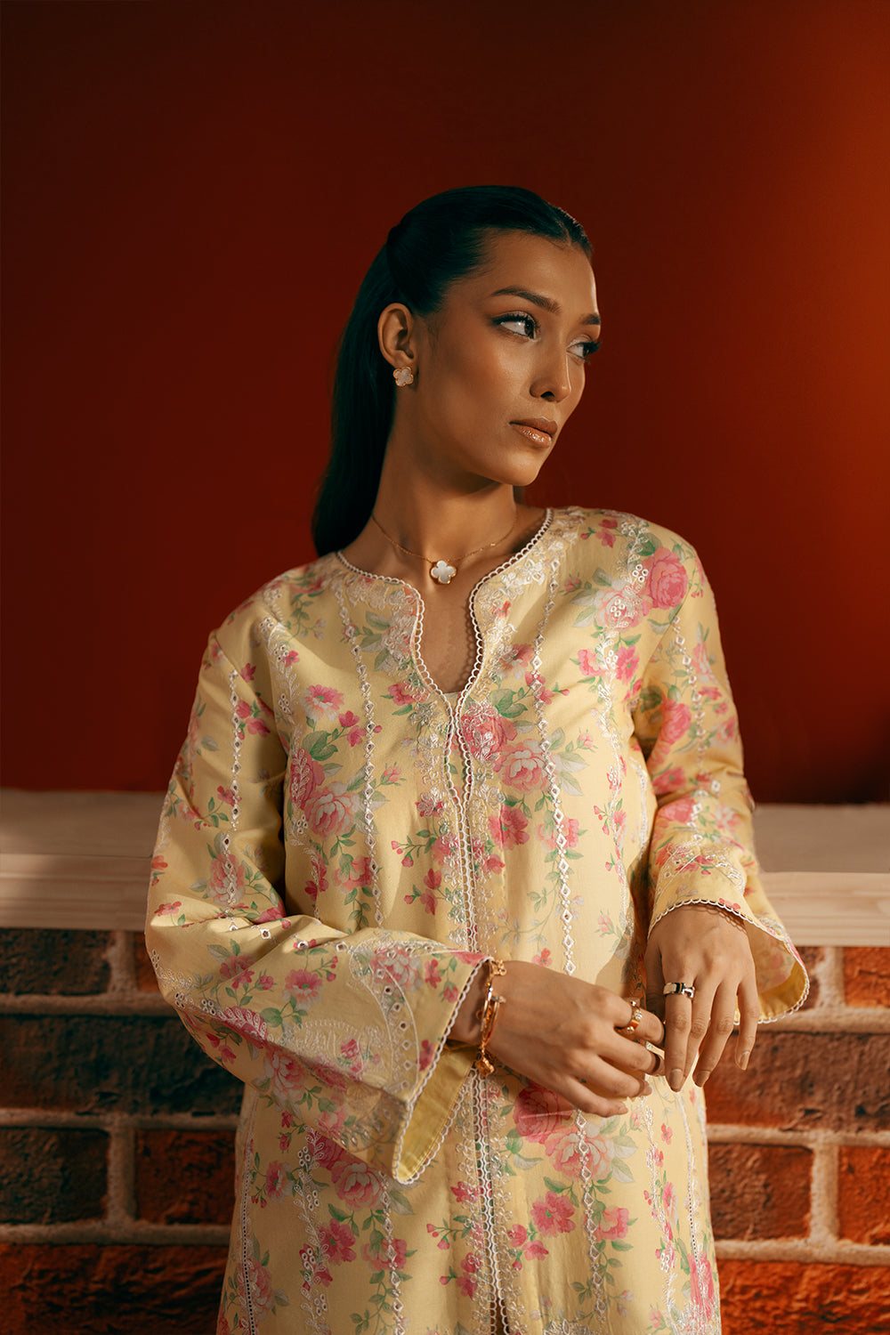 Model wearing yellow floral embroidered outfit from Saira Rizwan Joolie | YELLOW-JBP25-01, Pakistani luxury pret available online in UK.