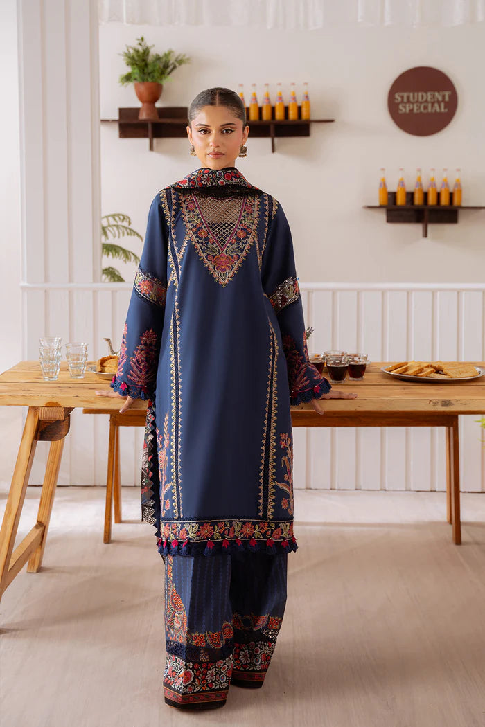Model wearing navy blue ELIF-A-SRL25-05 from Saira Rizwan Laneem SS/25, ideal for Pakistani luxury pret and Pakistani clothes online in UK.