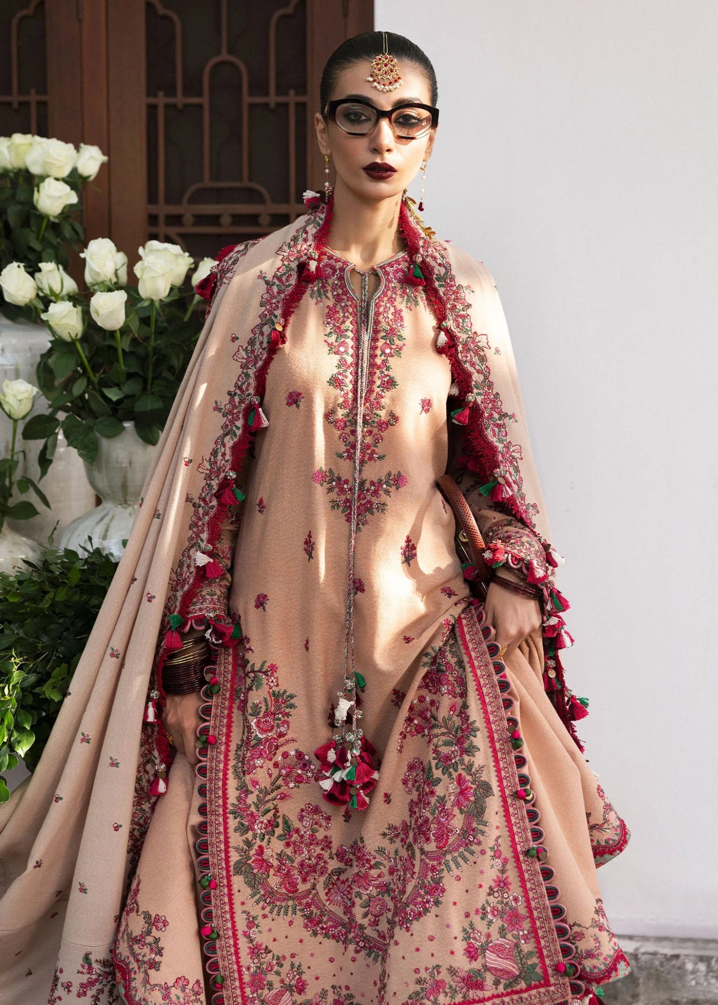 Model wearing Lali from Hussain Rehar's Karandi AW '24, showcasing luxury Pakistani clothes online in UK.