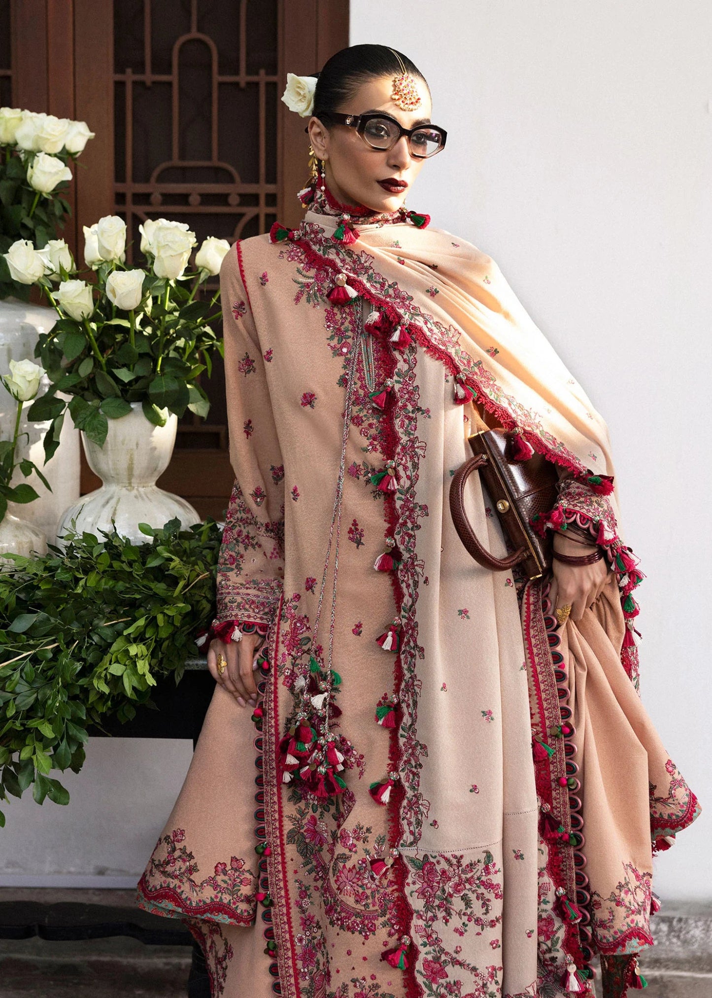 Model wearing Lali from Hussain Rehar's Karandi AW '24, showcasing luxury Pakistani clothes online in UK.