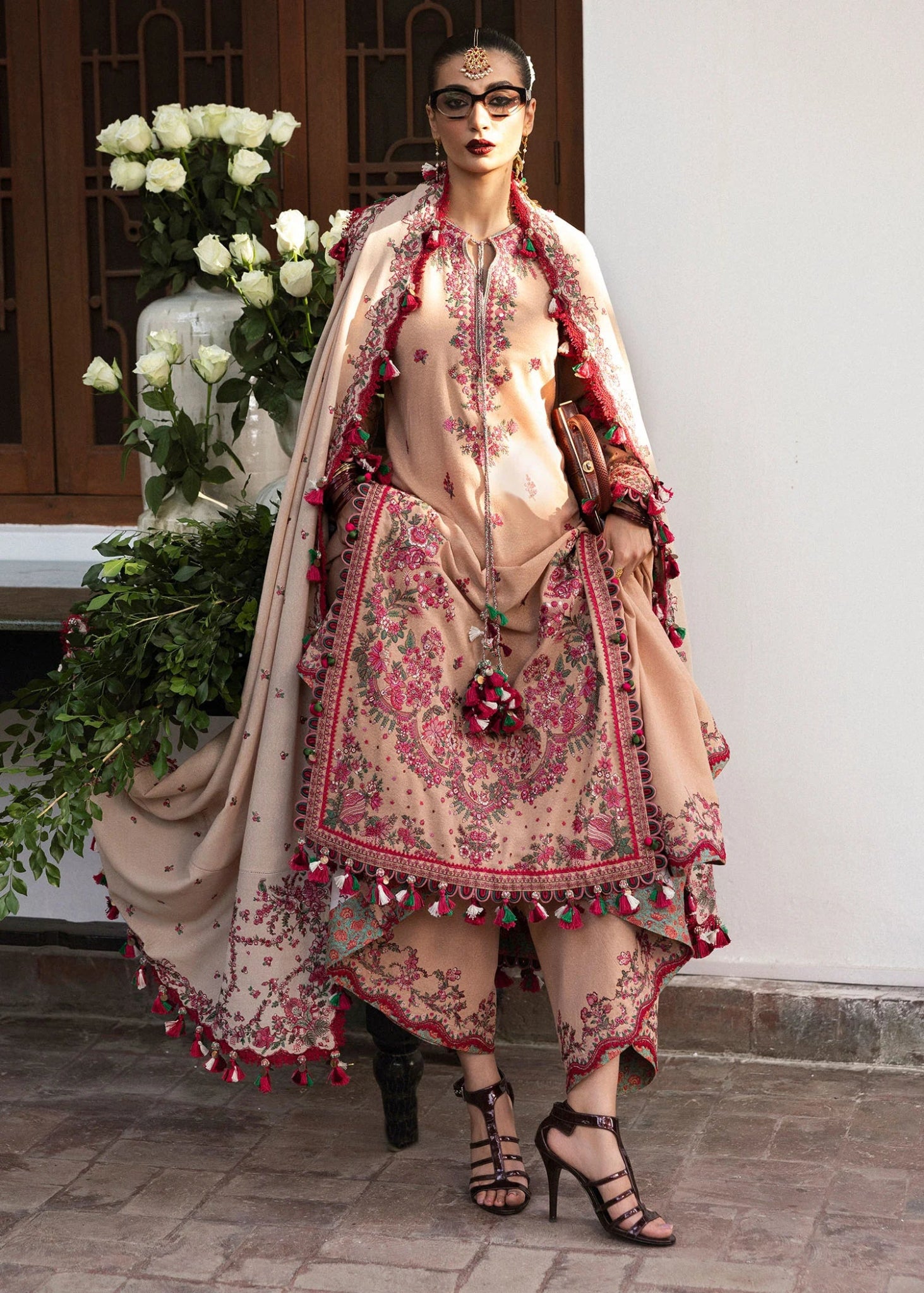 Model wearing Lali from Hussain Rehar's Karandi AW '24, showcasing luxury Pakistani clothes online in UK.
