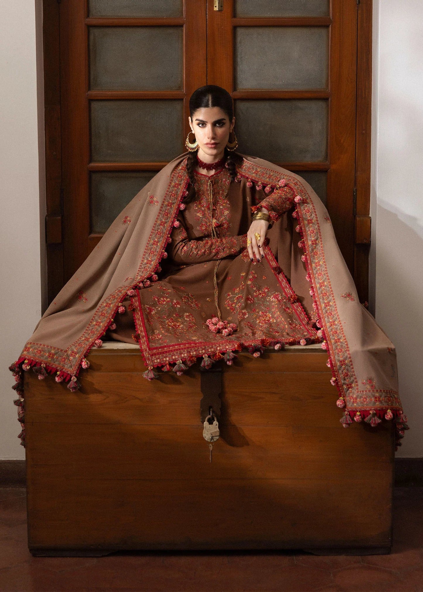 Model wearing Shay from Hussain Rehar's Karandi AW '24, showcasing luxury Pakistani clothes online in UK.
