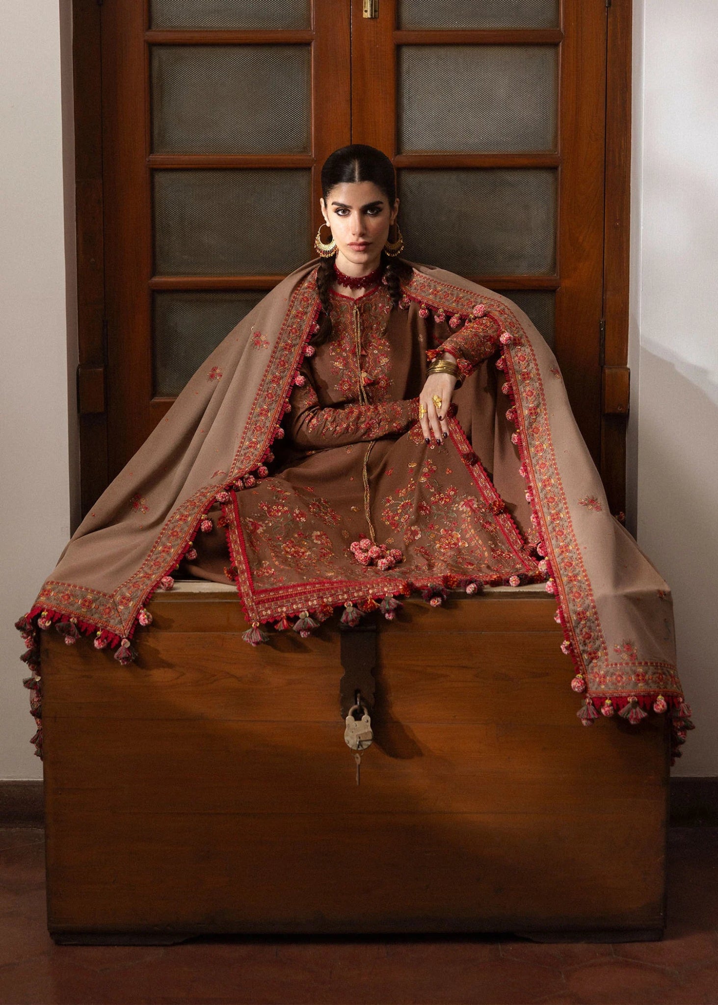 Model wearing Shay from Hussain Rehar's Karandi AW '24, showcasing luxury Pakistani clothes online in UK.