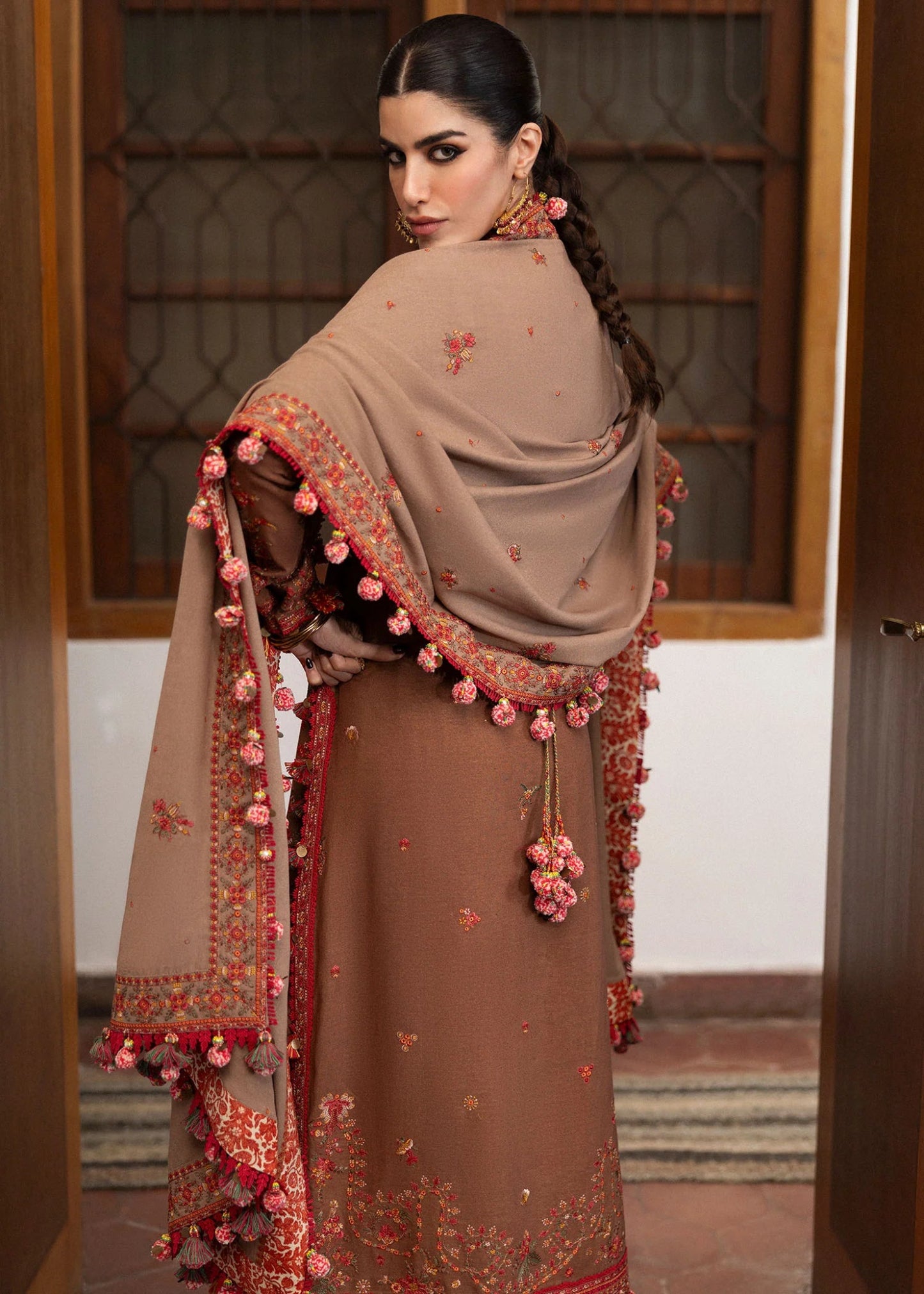 Model wearing Shay from Hussain Rehar's Karandi AW '24, showcasing luxury Pakistani clothes online in UK.