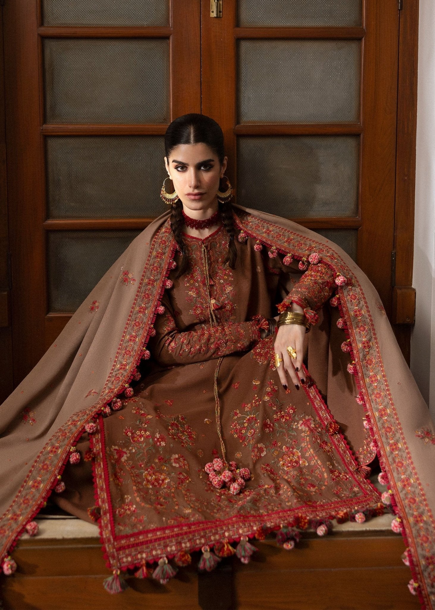 Model wearing Shay from Hussain Rehar's Karandi AW '24, showcasing luxury Pakistani clothes online in UK.