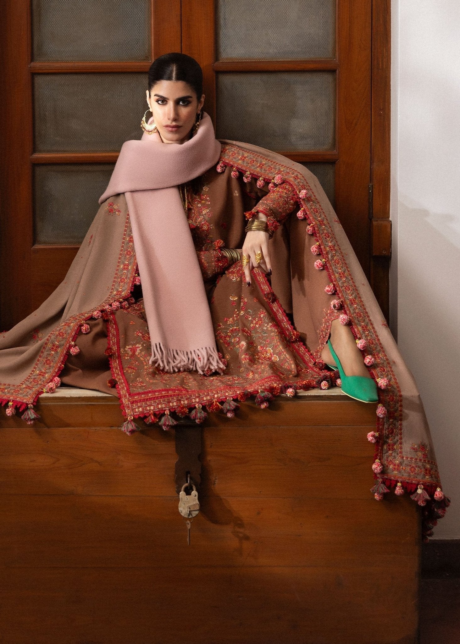 Model wearing Shay from Hussain Rehar's Karandi AW '24, showcasing luxury Pakistani clothes online in UK.