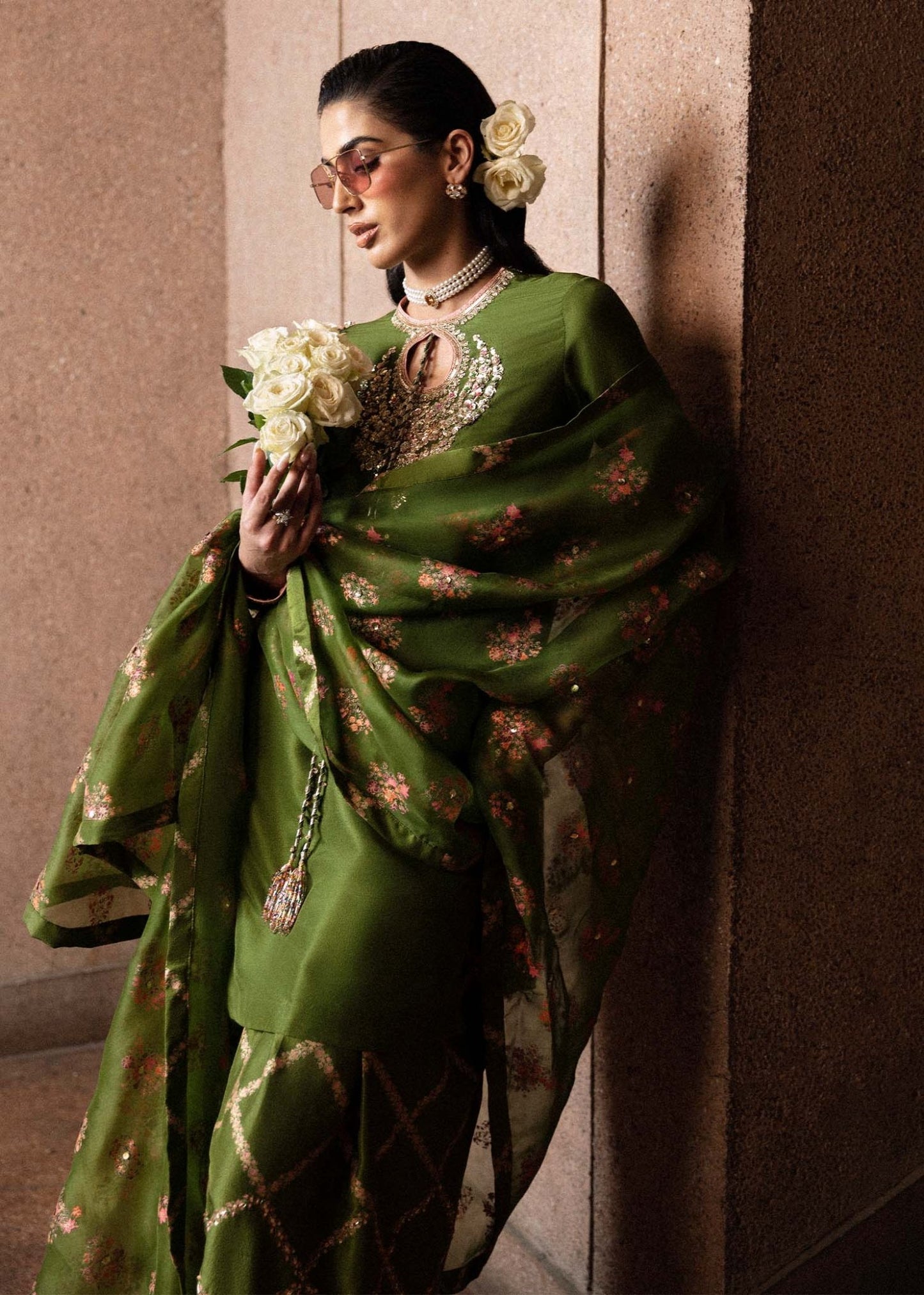 Model wearing an elegant green Celeine dress from Hussain Rehar's Luxury Pret Eid '24 collection. Pakistani clothes online in UK.