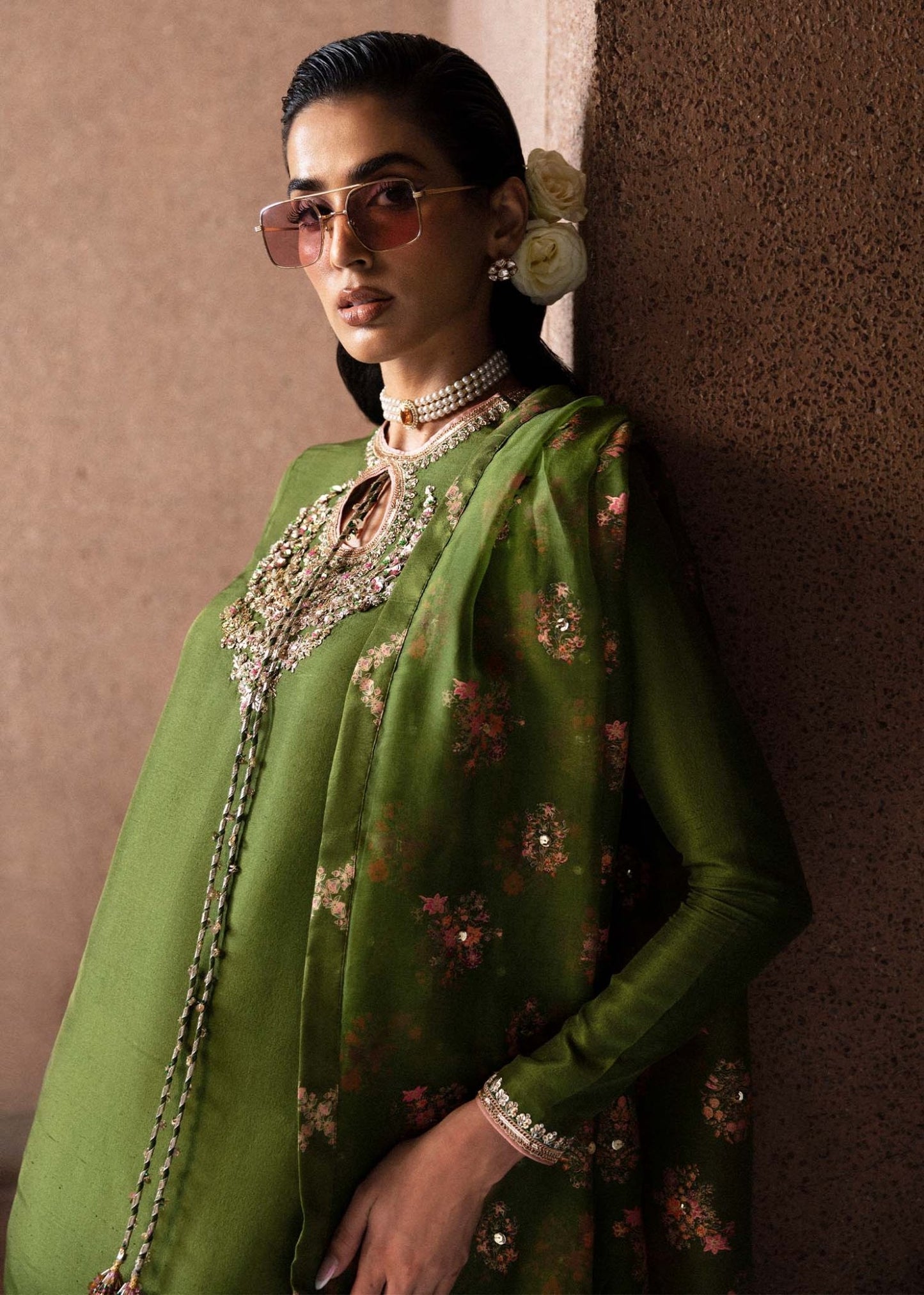 Model wearing an elegant green Celeine dress from Hussain Rehar's Luxury Pret Eid '24 collection. Pakistani clothes online in UK.