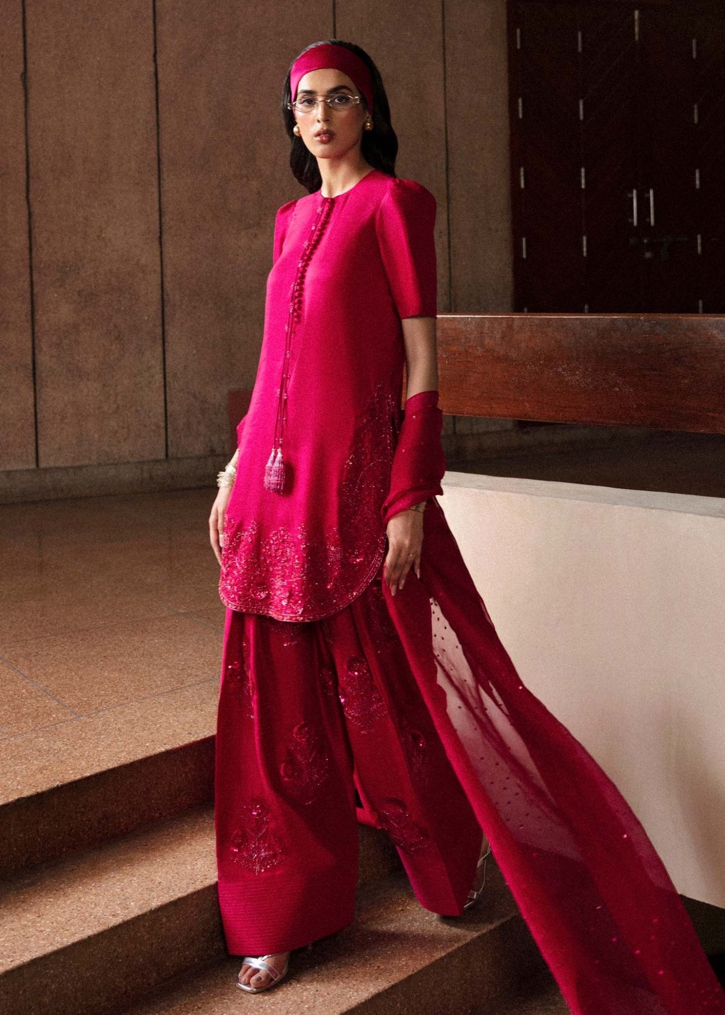 Model wearing a vibrant pink Cerise dress from Hussain Rehar's Luxury Pret Eid '24 collection. Pakistani clothes online in UK.