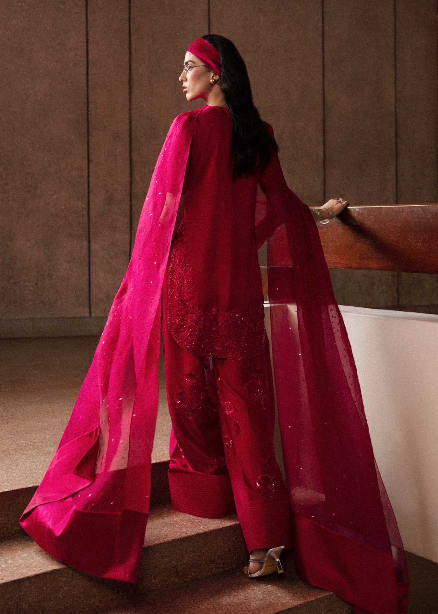 Model wearing a vibrant pink Cerise dress from Hussain Rehar's Luxury Pret Eid '24 collection. Pakistani clothes online in UK.