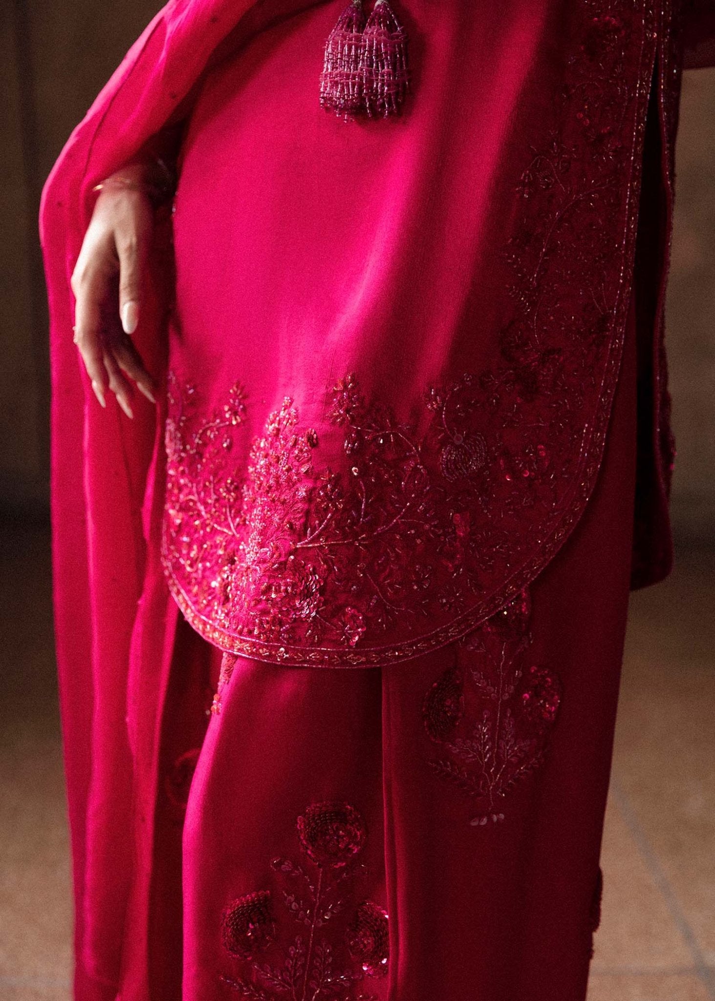 Model wearing a vibrant pink Cerise dress from Hussain Rehar's Luxury Pret Eid '24 collection. Pakistani clothes online in UK.