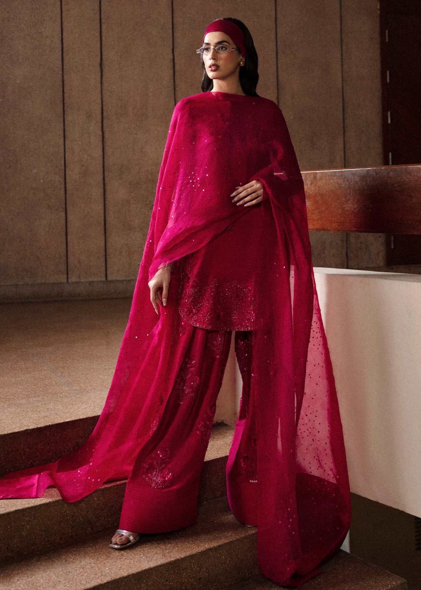 Model wearing a vibrant pink Cerise dress from Hussain Rehar's Luxury Pret Eid '24 collection. Pakistani clothes online in UK.