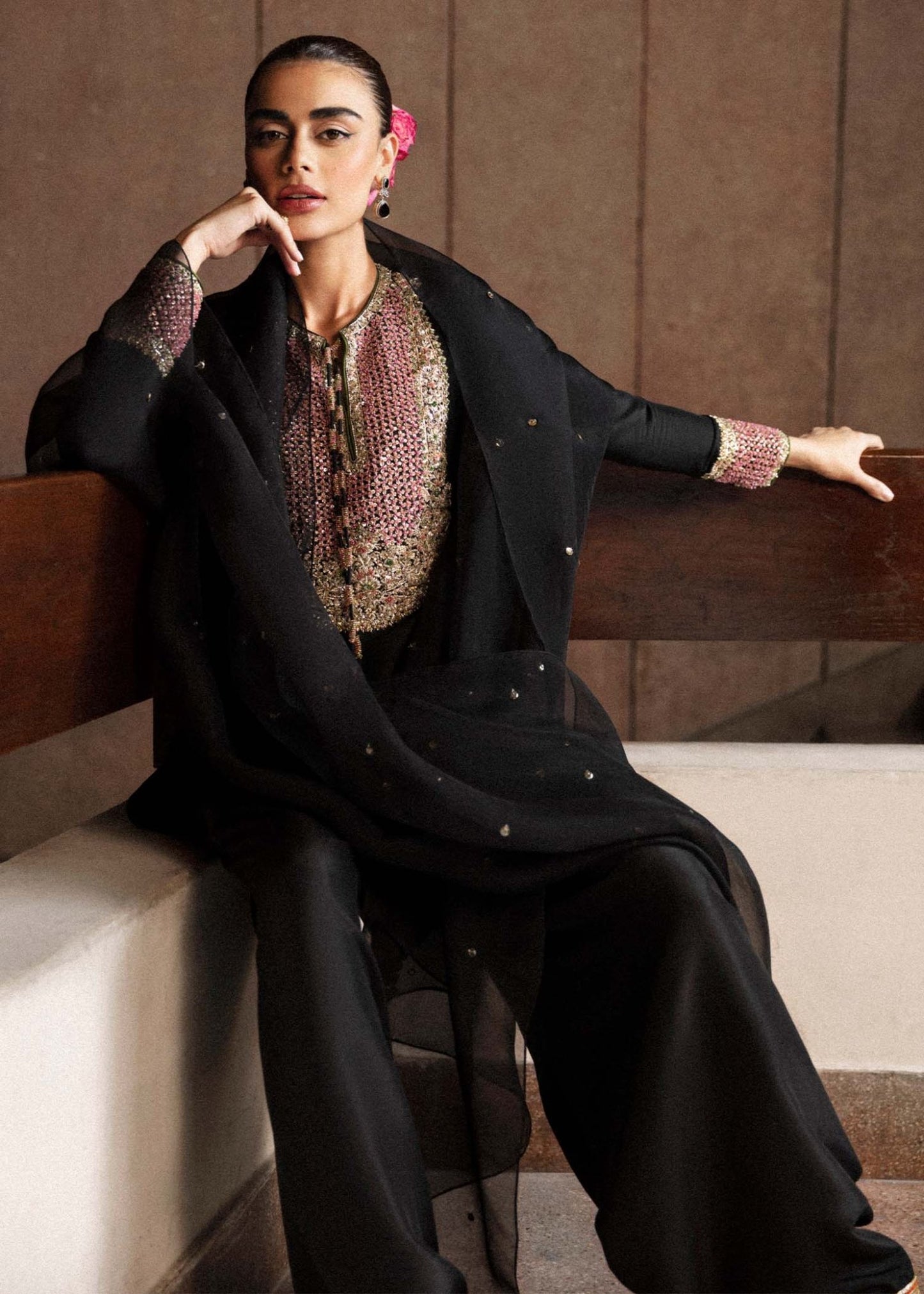 Model wearing a black Char dress from Hussain Rehar's Luxury Pret Eid '24 collection. Pakistani clothes online in UK.