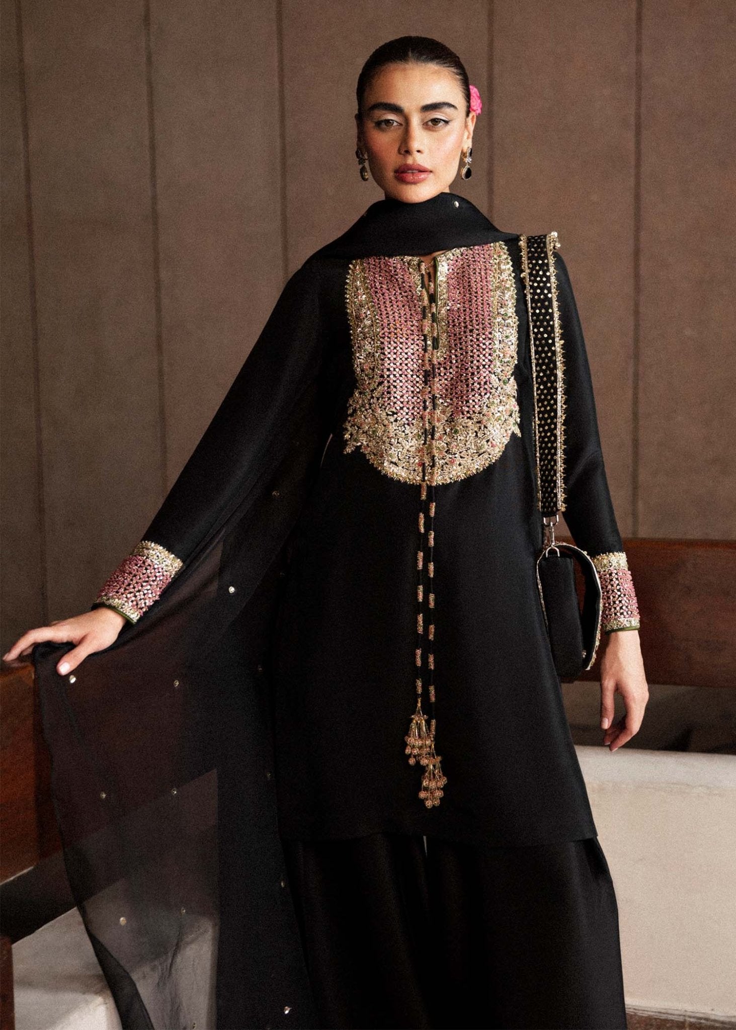 Model wearing a black Char dress from Hussain Rehar's Luxury Pret Eid '24 collection. Pakistani clothes online in UK.