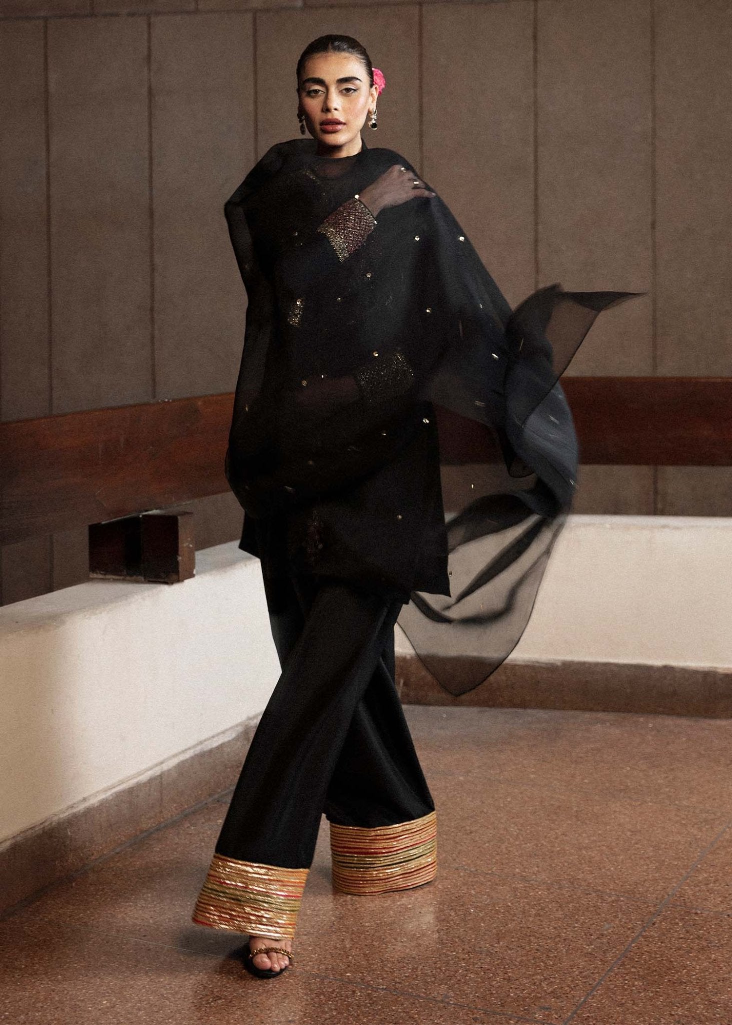 Model wearing a black Char dress from Hussain Rehar's Luxury Pret Eid '24 collection. Pakistani clothes online in UK.
