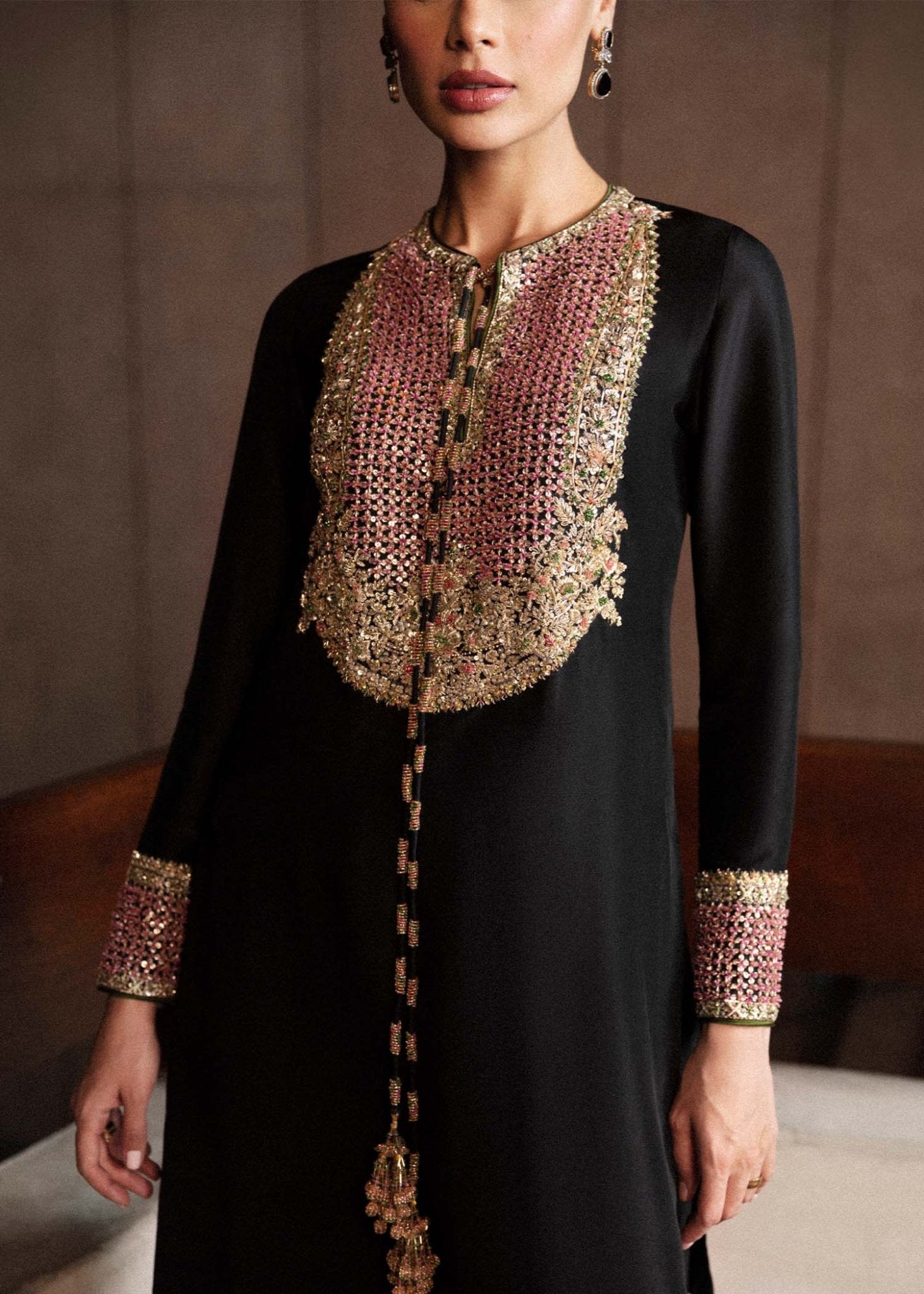 Model wearing a black Char dress from Hussain Rehar's Luxury Pret Eid '24 collection. Pakistani clothes online in UK.
