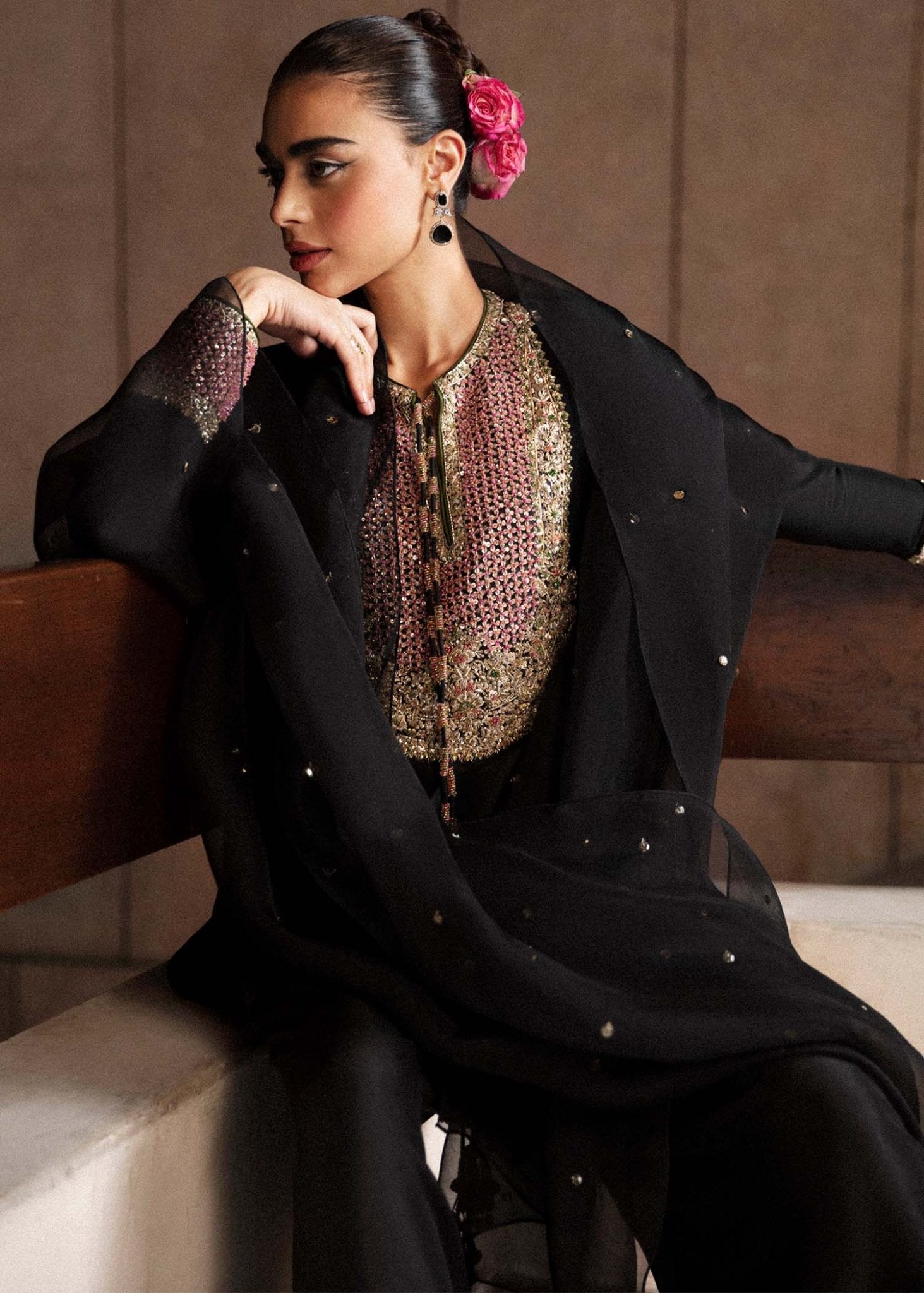Model wearing a black Char dress from Hussain Rehar's Luxury Pret Eid '24 collection. Pakistani clothes online in UK.