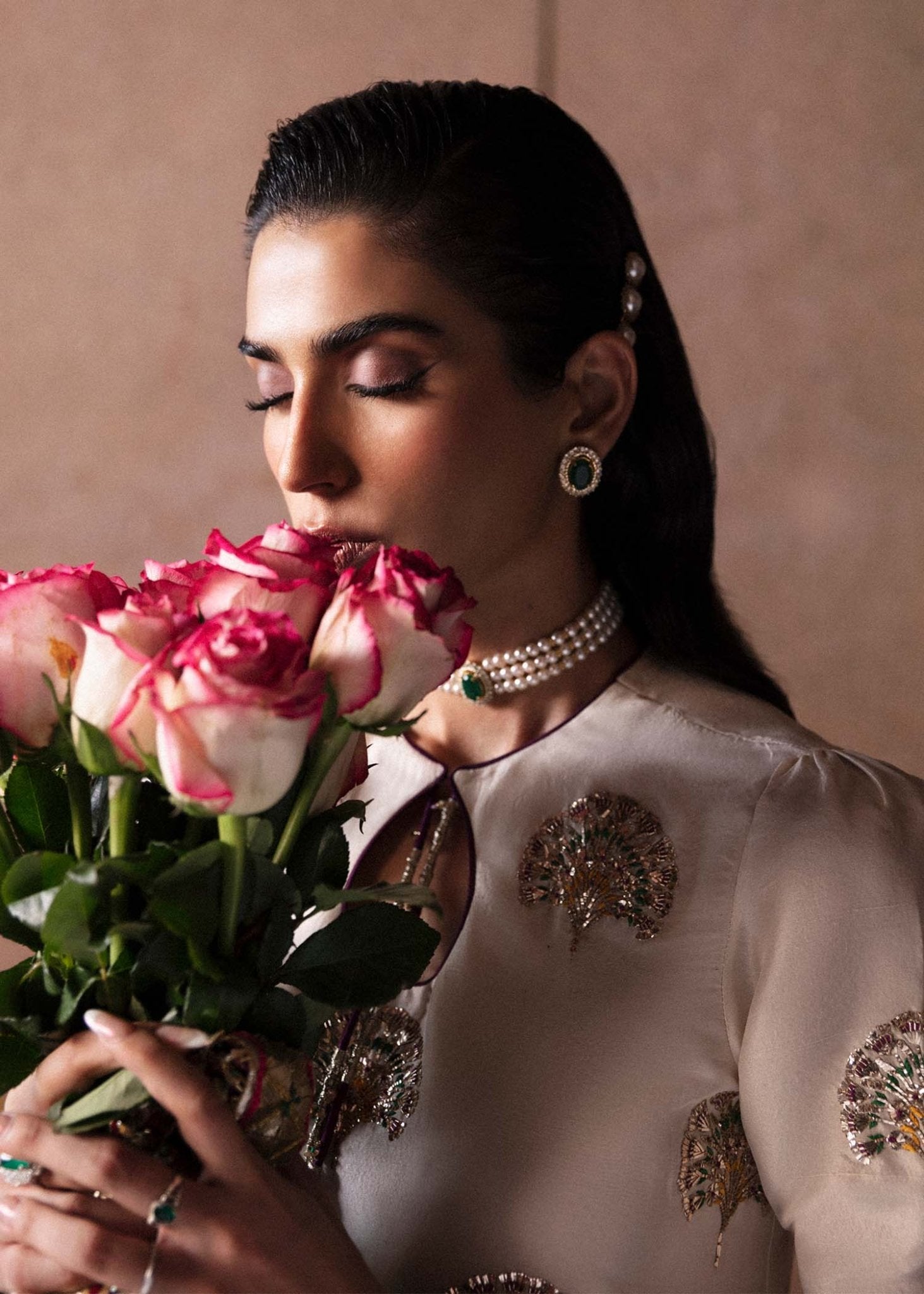 Model wearing an elegant white Lin dress from Hussain Rehar's Luxury Pret Eid '24 collection. Pakistani clothes online in UK.