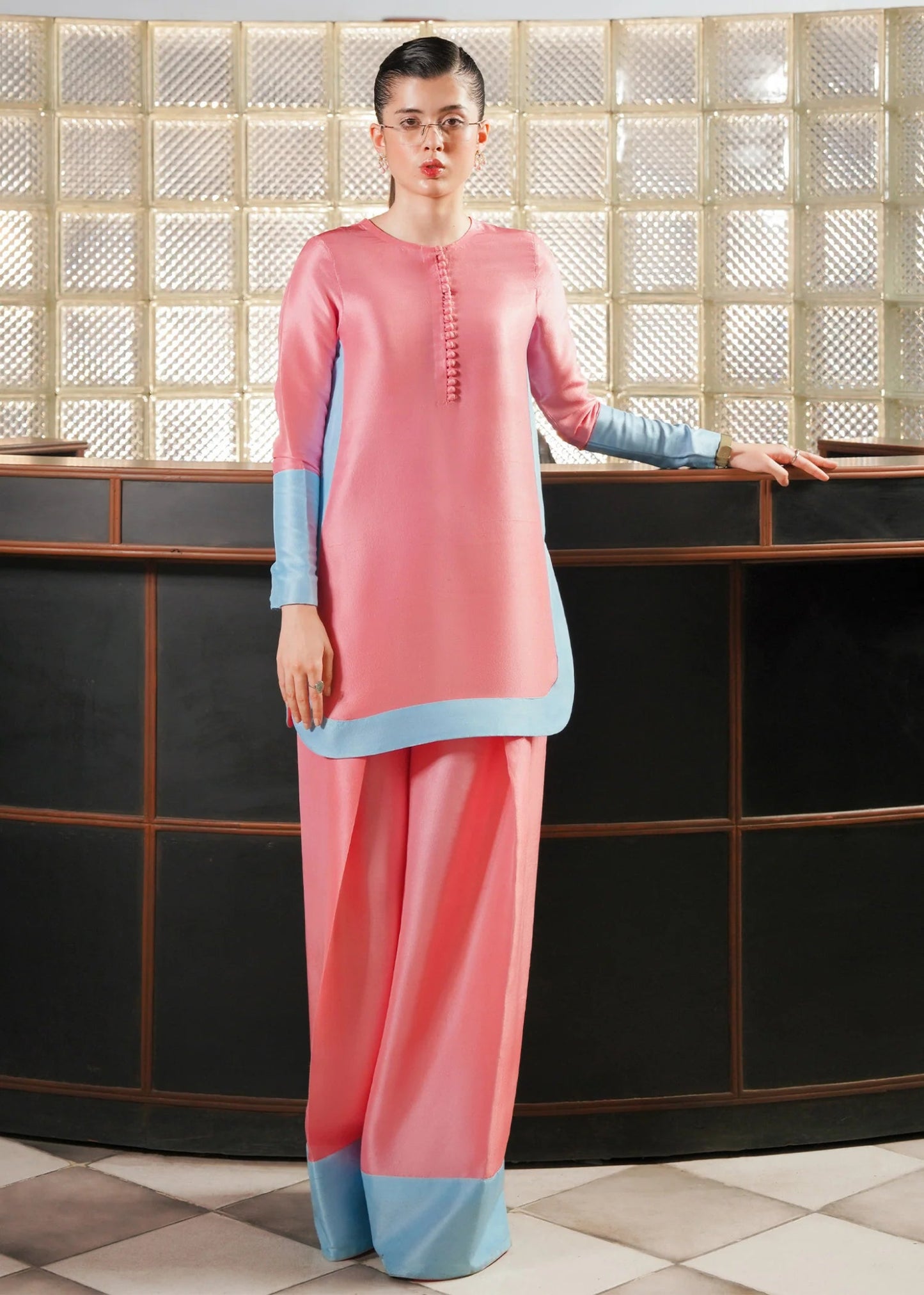 Model wearing Hibiscus dress from Hussain Rehar's Pay Day Vol. IV collection. Discover Hussain Rehar and Pakistani clothes online in UK at Signature Labels.