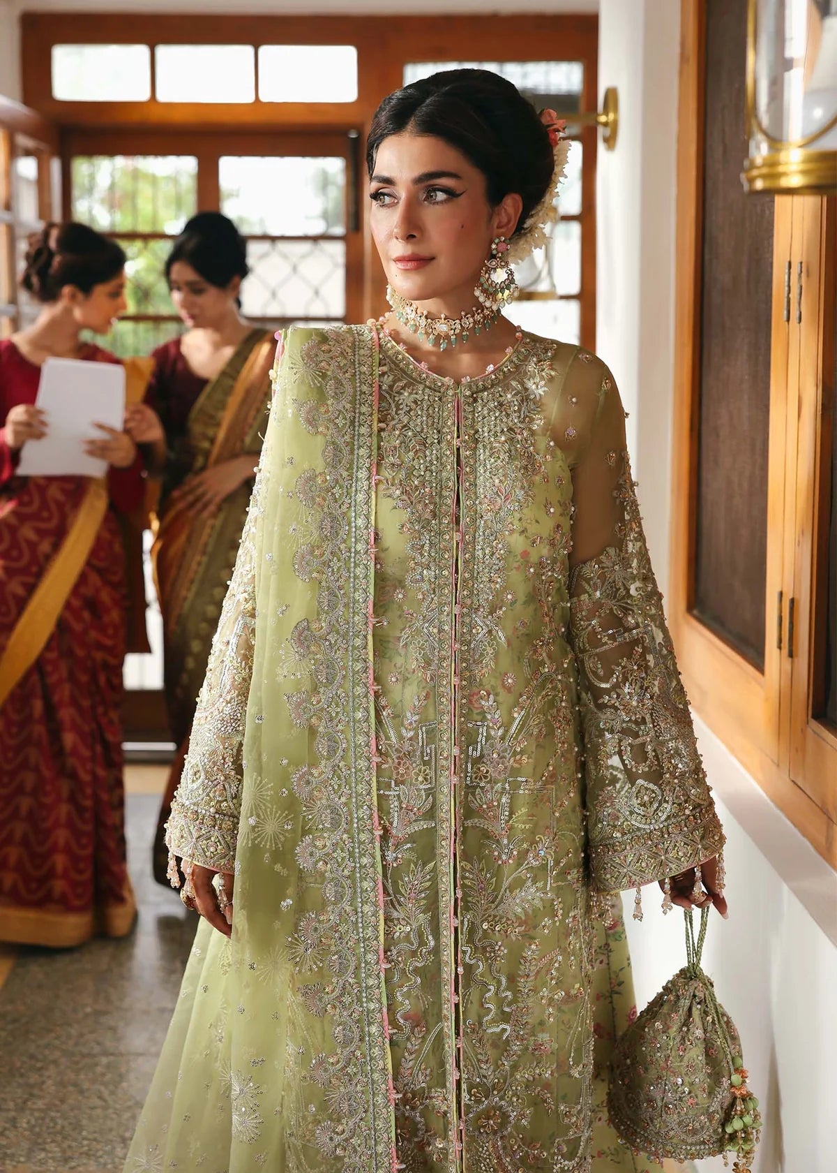 Model wearing Pakiza by Kanwal Malik in pastel green embroidered chiffon – Pakistani luxury pret available online in UK.