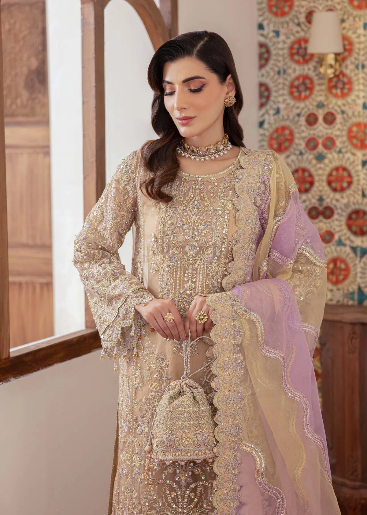 Model wearing beige and lilac Mahin outfit from Kanwal Malik—Pakistani luxury pret perfect for festive wear, shop online in UK now.