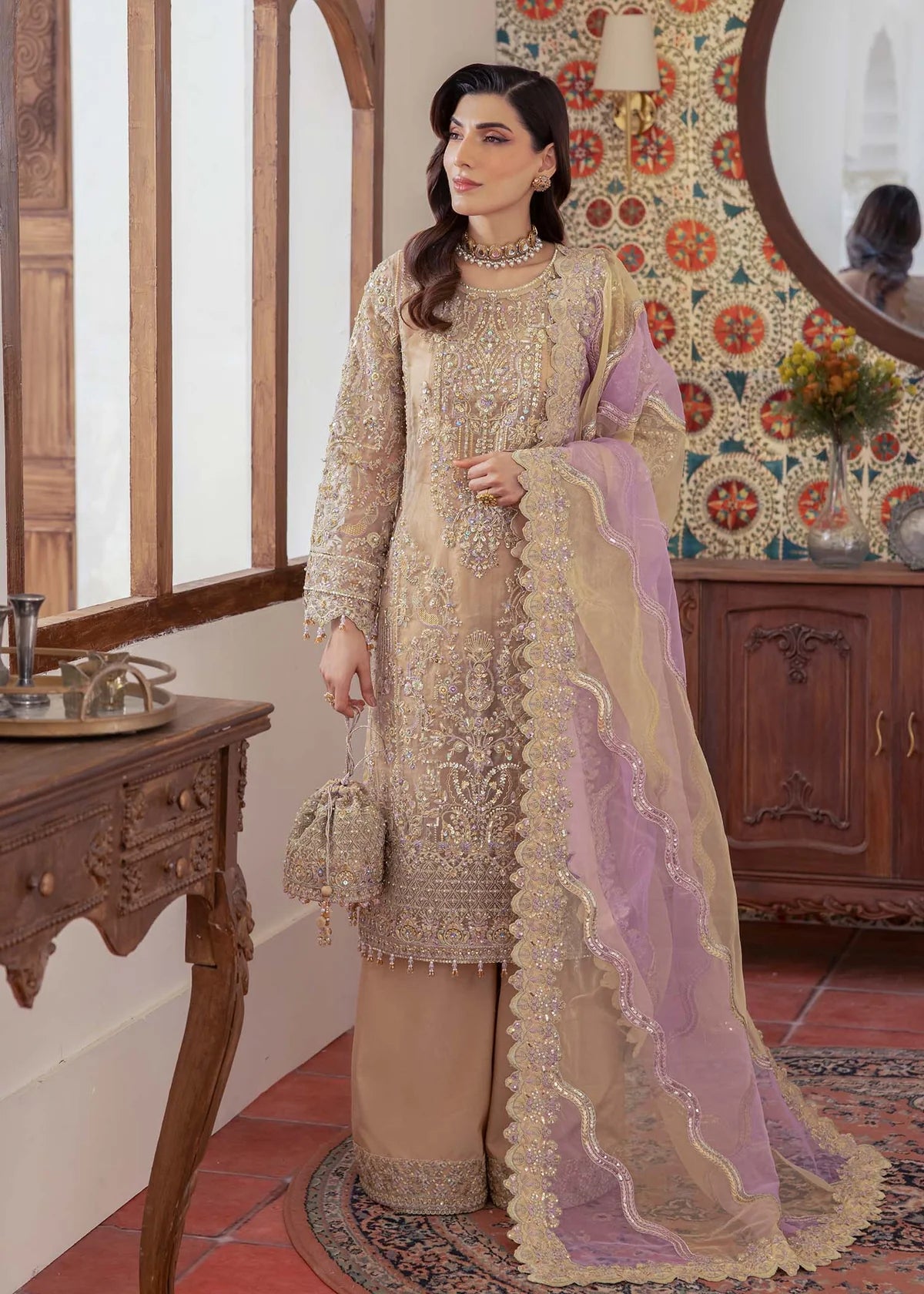 Model wearing beige and lilac Mahin outfit from Kanwal Malik—Pakistani luxury pret perfect for festive wear, shop online in UK now.