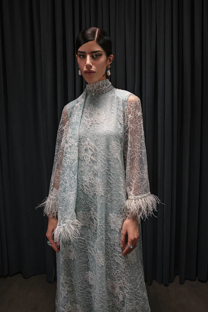Model wearing Saira Rizwan Luxury Pret Chantilly '23 NEVAN dress, showcasing Pakistani clothes online in UK.