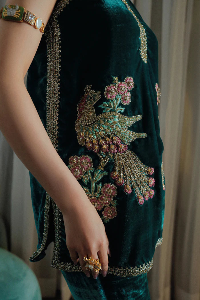Model in emerald Simone dress from Saira Rizwan Luxury Pret Riona '23, an icon of Pakistani chic in the UK.