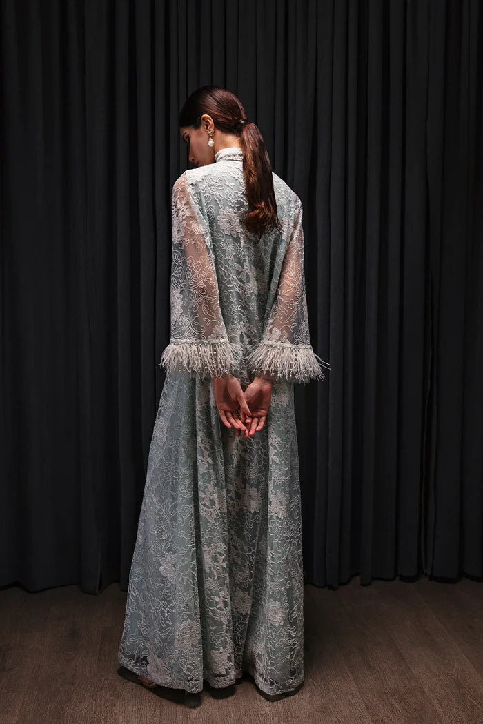 Model wearing Saira Rizwan Luxury Pret Chantilly '23 NEVAN dress, showcasing Pakistani clothes online in UK.