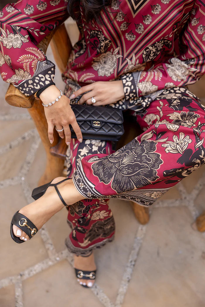 Model wearing maroon co-ord set with beige and black floral print from Saira Rizwan, Pakistani Luxury pret, Pakistani clothes online in UK.