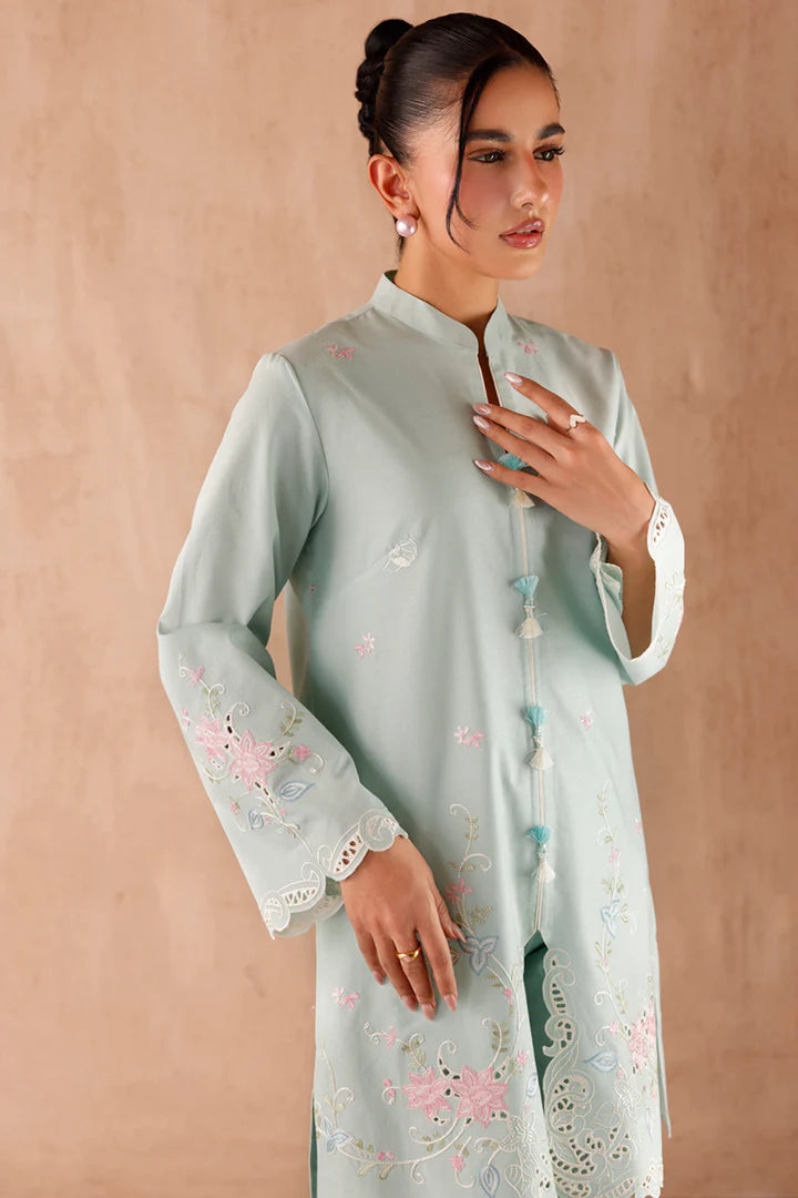 Model wearing mint green embroidered coords EP-06 Juni from Qalamkar, Pakistani luxury pret online in UK.