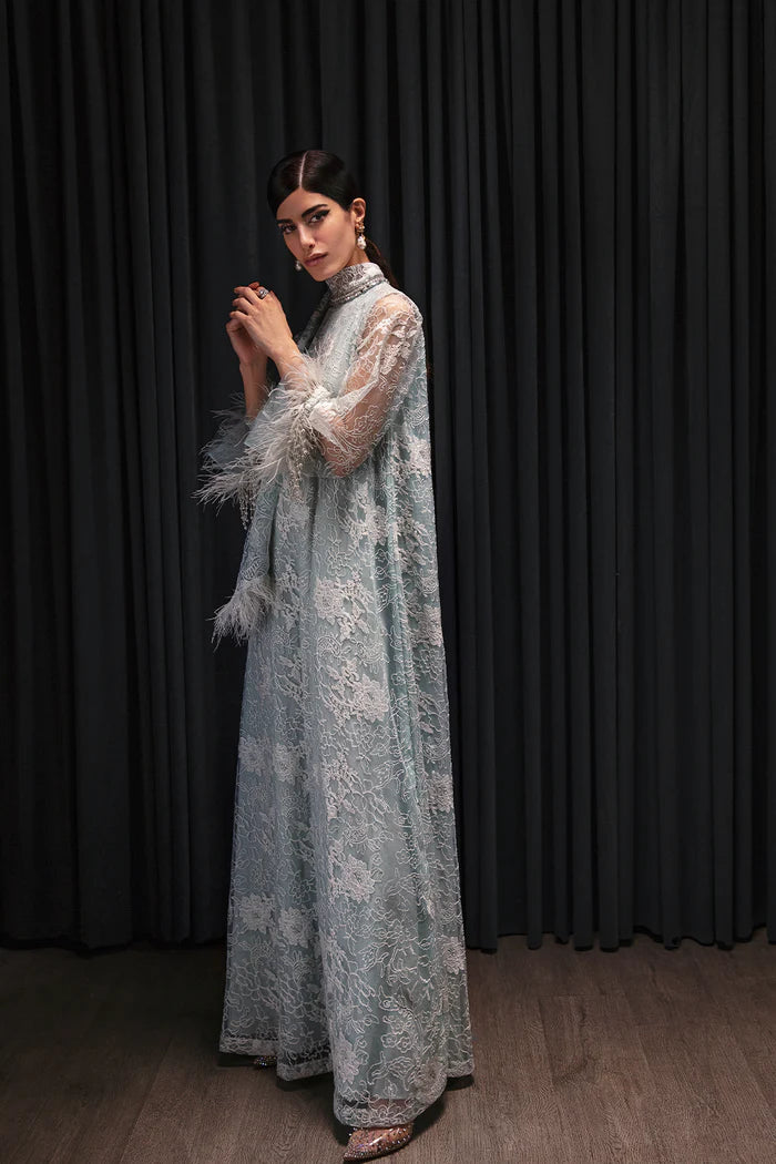 Model wearing Saira Rizwan Luxury Pret Chantilly '23 NEVAN dress, showcasing Pakistani clothes online in UK.