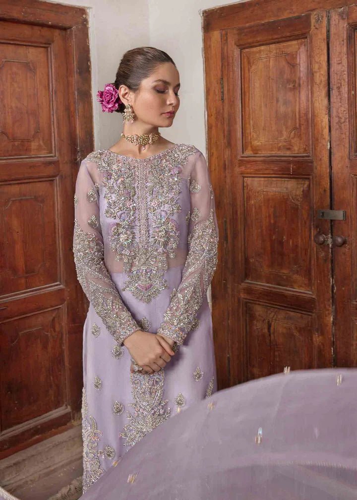 Model in Kanwal Malik Angana '23 Jamani dress, epitomizing Pakistani wedding attire online in the UK.