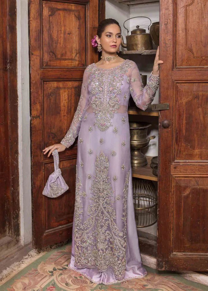 Model in Kanwal Malik Angana '23 Jamani dress, epitomizing Pakistani wedding attire online in the UK.