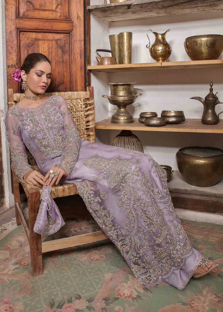 Model in Kanwal Malik Angana '23 Jamani dress, epitomizing Pakistani wedding attire online in the UK.
